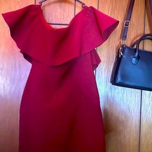 Burgundy dress, reaches to knees